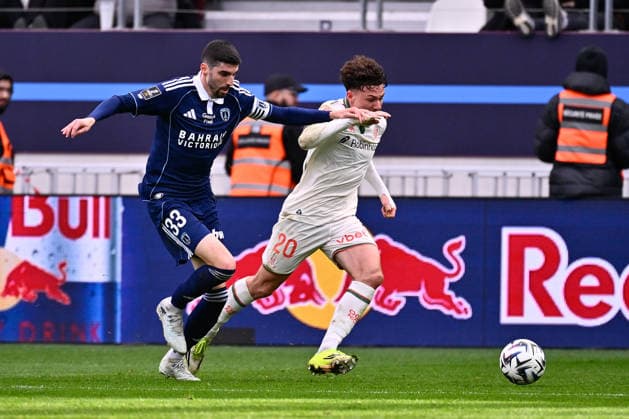 FOOTBALL : Paris FC vs Nice - Ligue 1 - 01 03 2026 Pierre Lees Melou ( 33 - PFC ) and Tom Louchet ( 20 - Nice ) during the Ligue 1 match between Paris FC and OGC Nice at Stade Jean Bouin on March 01, 2026 in Paris, France. ( Photo by Federico Pestellini PsnewZ ) - ParisFrance  Copyright: xFedericoxPestelinix