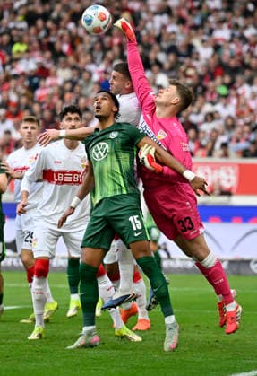 Penalty area scene, goal area scene Goalkeeper Alexander Nuebel VfB Stuttgart 33 vs Moritz Jenz VfL Wolfsburg 15 Ermedin Demirovic VfB Stuttgart 09 VfB Stuttgart vs VfL Wolfsburg WOB 01 03 2026 DFL REGULATIONS PROHIBIT ANY USE OF PHOTOGRAPHS AS IMAGE SEQUENCES AND OR QUASI VIDEO VfB Stuttgart vs VfL Wolfsburg WOB