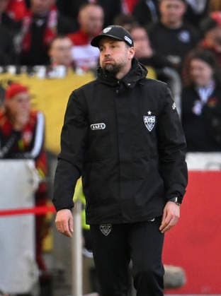 Coach Sebastian Hoeness VfB Stuttgart on the sidelines Gestures Gesture Relieves big cheeks Breathes through VfB Stuttgart vs VfL Wolfsburg WOB 01 03 2026 DFL REGULATIONS PROHIBIT ANY USE OF PHOTOGRAPHS AS IMAGE SEQUENCES AND OR QUASI VIDEO VfB Stuttgart vs VfL Wolfsburg WOB