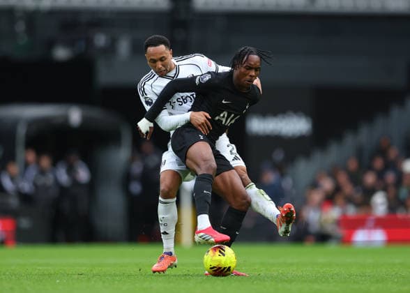 1st March 2026; Craven Cottage, Fulham, London, England; Premier League Football, Fulham versus Tottenham Hotspur; Mathys Tel of Tottenham Hotspur under pressure from Kenny Tete of Fulham  JPxFletcher Content restricted for UK based newspaper