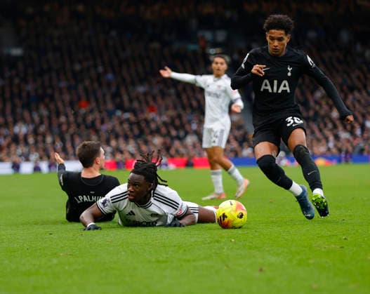 Fulham v Tottenham Hotspur, London, UK -01 Mar 2026 Calvin Bassey of Fulham fc goes down during the Premier League match between Fulham and Tottenham Hotspur at Craven Cottage, London on 01 March 2026 ( London Craven Cottage London England Copyright: xTomxCusden PPAUKx PPA-252200
