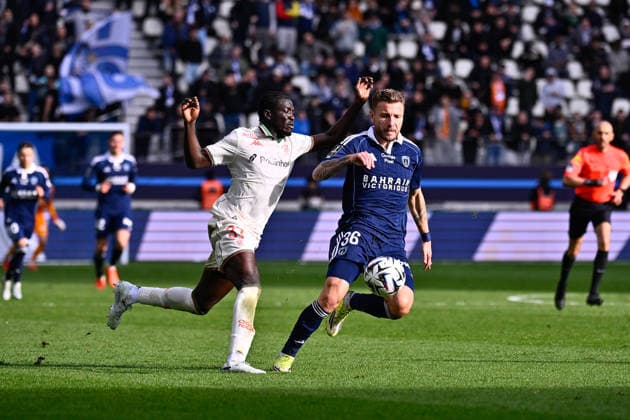 FOOTBALL : Paris FC vs Nice - Ligue 1 - 01 03 2026 Ciro Immobile ( 36 - PFC ) and Kojo Peprah Oppong ( 37 - Nice ) during the Ligue 1 match between Paris FC and OGC Nice at Stade Jean Bouin on March 01, 2026 in Paris, France. ( Photo by Federico Pestellini PsnewZ ) - ParisFrance  Copyright: xFedericoxPestelinix