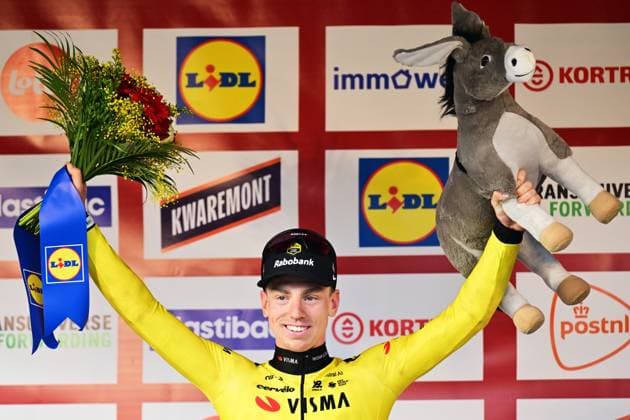 Great Britain s Matthew Brennan of Team Visma-Lease a Bike celebrates on the podium after winning the 78th edition of the men elite race of the Kuurne-Brussels-Kuurne one day cycling race, 195 km from Kuurne to Kuurne via Brussels, Sunday 01 March 2026. DIRKxWAEM  x166108401x