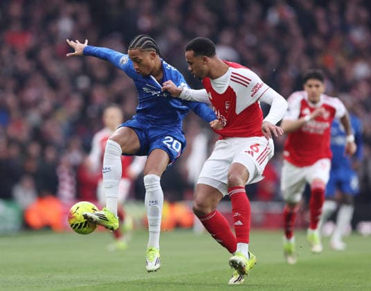 London, England, 1st March 2026. Joao Pedro of Chelsea (l) tussles with Gabriel of Arsenal (r) during the Arsenal vs Chelsea Premier League match at the Emirates Stadium, London. Picture credit should read: David Klein Sportimage EDITORIAL USE ONLY. No use with unauthorised audio, video, data, fixture lists, club league logos or live services. Online in-match use limited to 120 images, no video emulation. No use in betting, games or single club league player publications. SPI_014_DK_Arsenal_Chelsea SPI-4568-0014
