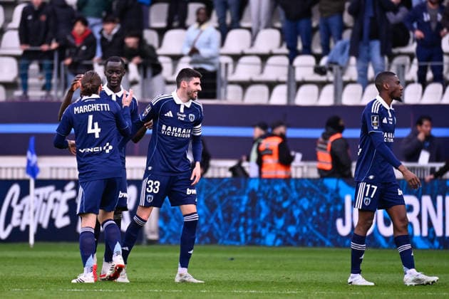 FOOTBALL : Paris FC vs Nice - Ligue 1 - 01 03 2026 Vincent Marchetti ( 4 - PFC ) , Moustapha MBOW ( 5 - PFC ) and Pierre Lees Melou ( 33 - PFC ) celebrate following the Ligue 1 match between Paris FC and OGC Nice at Stade Jean Bouin on March 01, 2026 in Paris, France. ( Photo by Federico Pestellini PsnewZ ) - ParisFrance  Copyright: xFedericoxPestelinix
