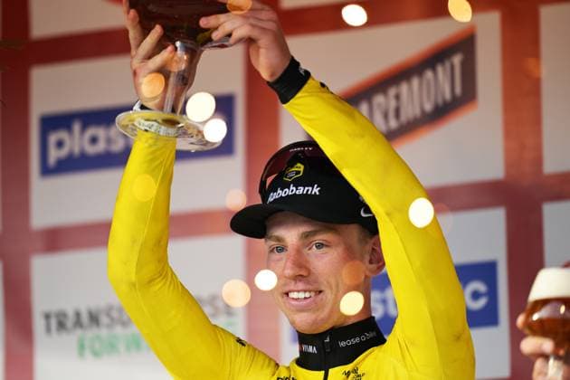 Great Britain s Matthew Brennan of Team Visma-Lease a Bike celebrates on the podium after winning the 78th edition of the men elite race of the Kuurne-Brussels-Kuurne one day cycling race, 195 km from Kuurne to Kuurne via Brussels, Sunday 01 March 2026. DAVIDxPINTENS  x166112554x