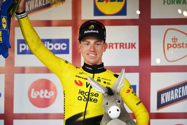 Great Britain s Matthew Brennan of Team Visma-Lease a Bike celebrates on the podium after winning the 78th edition of the men elite race of the Kuurne-Brussels-Kuurne one day cycling race, 195 km from Kuurne to Kuurne via Brussels, Sunday 01 March 2026. DAVIDxPINTENS  x166113004x