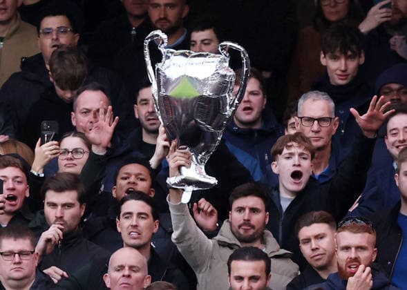 London, England, 1st March 2026. Chelsea fans taunt Arsenal fans with a blow up Champions League Trophy during the Arsenal vs Chelsea Premier League match at the Emirates Stadium, London. Picture credit should read: David Klein Sportimage EDITORIAL USE ONLY. No use with unauthorised audio, video, data, fixture lists, club league logos or live services. Online in-match use limited to 120 images, no video emulation. No use in betting, games or single club league player publications. SPI_023_DK_Arsenal_Chelsea SPI-4568-0023