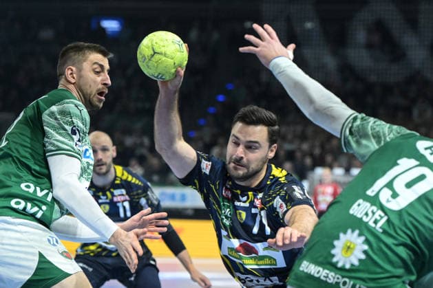 01 03 2026, xlakx, Handball Daikin HBL, Fuechse Berlin Rhein Neckar Löwen v l Dani Baijens Rhein Neckar Loewen duel, fight, tackle Berlin Daniel Lakomski