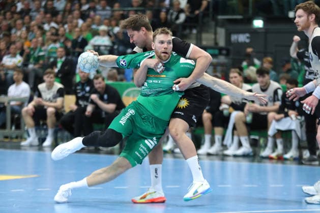 Handball DAIKIN HBL, SC DHfK Leipzig Bergischer HC 01 03 2026 William Bogojevic 20, SC DHfK Leipzig is stopped by Lars Kooij 15, Bergischer HC Handball, DAIKIN HBL, 1 Bundesliga, Season 2025 2026, Matchday 23 SC DHfK Leipzig vs Bergischer HC on 01 03 2026 at Quarterback Immobilien Arena Leipzig Copyright: xBEAUTIFULxSPORTS JanxKaeferx