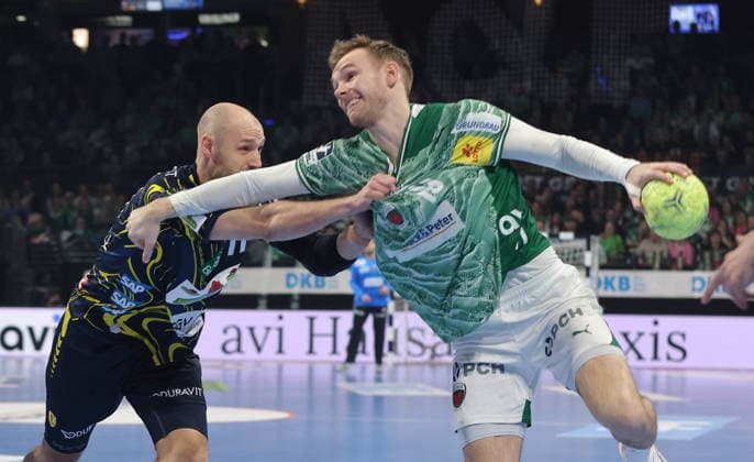 Lukas Sandell, Mathias Gidsel on the ball duel Match scene Action Sport Handball HBL Bundesliga Men 23 Matchday Season 2025 2026 01 03 2026 Füchse Berlin vs Rhein Neckar Löwen RNL