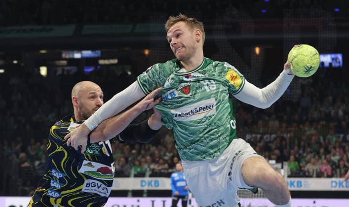 Lukas Sandell, Mathias Gidsel on the ball duel Match scene Action Sport Handball HBL Bundesliga Men 23 Matchday Season 2025 2026 01 03 2026 Füchse Berlin vs Rhein Neckar Löwen RNL