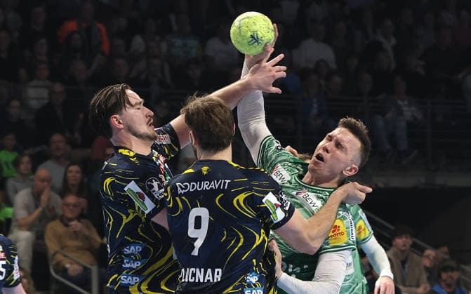 Robert Timmermeister, Steven Plucnar Jacobsen, Lasse Andersson duel Match scene Action Sport Handball HBL Bundesliga Men 23 Matchday Season 2025 2026 01 03 2026 Füchse Berlin vs Rhein Neckar Löwen RNL