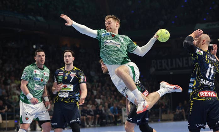 Mathias Gidsel scores a goal against David Späth duel Game scene Action Sport Handball HBL Bundesliga Men 23 Matchday Season 2025 2026 01 03 2026 Füchse Berlin vs Rhein Neckar Löwen RNL