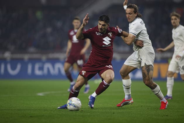 Giovanni Simeone of Torino FC and Luca Pellegrini of SS Lazio during the Italian Serie A, season 2025-2026, football match between Torino FC and SS Lazio on 01 March 2026 at Stadio Olimpico Grande Torino, Turin, Italy. Photo, Nderim Kaceli  Copyright: xNderimxKaceli IPAxSportx xipa-agency.netx xx IPA_72228405 IPA_Agency_IPA72228405