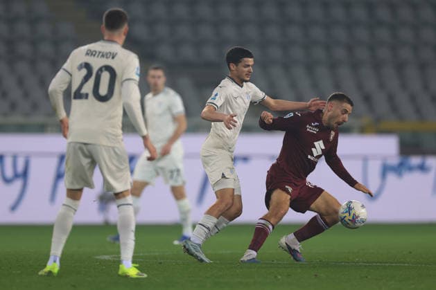 Turin, Italy, 1st March 2026. Petar Raktov of SS Lazio looks on as team mate Reda Belahyane tussles with Nikola Vlasic of Torino FC during the Torino vs SS Lazio Serie A match at Stadio Grande Torino, Turin. Picture credit should read: Jonathan Moscrop Sportimage EDITORIAL USE ONLY. No use with unauthorised audio, video, data, fixture lists, club league logos or live services. Online in-match use limited to 120 images, no video emulation. No use in betting, games or single club league player publications. SPI_026_TORO_LAZIO SPI-4554-0026