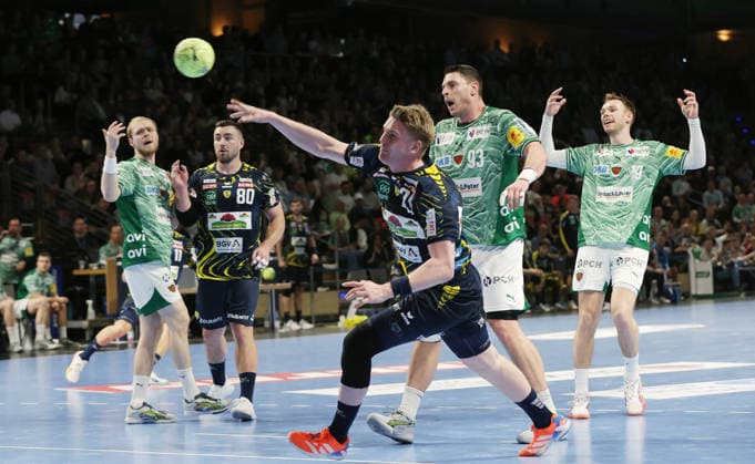 Haukur Thrastarson scores a goal against goalkeeper Dejan Milosavljev duel Game scene Action Sport Handball HBL Bundesliga Men 23 Matchday Season 2025 2026 01 03 2026 Füchse Berlin vs Rhein Neckar Löwen RNL
