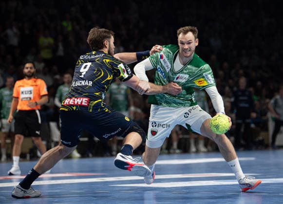 Handball, Men, Season 2025 2026, DAIKIN Handball Bundesliga 23 Matchday , Füchse Berlin Rhein Neckar Löwen, f l Steven Plucnar Jacobsen Löwen , Mathias Gidsel Füchse Berlin , 01 03 2026, Copyright: xSebastianxRäppold MatthiasxKochx