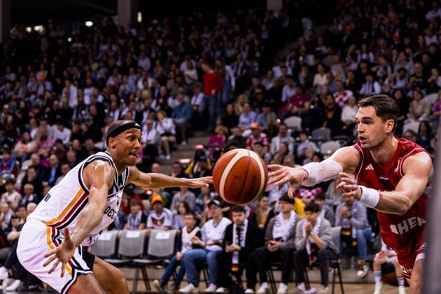BONN, GERMANY - MARCH 01: Mario Hezonja (Croatia, 8) controls the ball against Louis Olinde (Germany, 16) during the FIBA World Cup Qualifier match between Germany vs. Croatia at Telekom Dome Bonn on the first round of group E of the FIBA World Cup Qualifiers on March 01, 2026 in Bonn, Germany. North Rhine Westphalia Germany Copyright: xSteffiexWunderlx