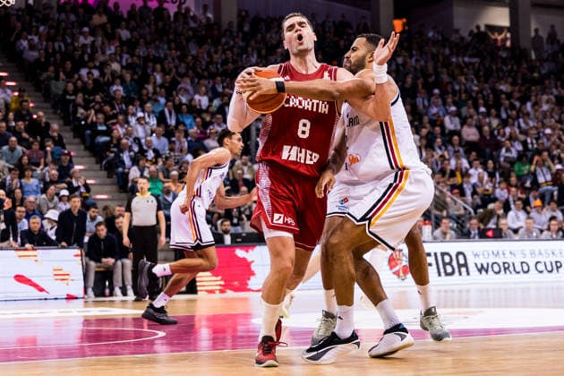 BONN, GERMANY - MARCH 01: Mario Hezonja (Croatia, 8) controls the ball, fouled by Johannes Thiemann (Germany, 32) during the FIBA World Cup Qualifier match between Germany vs. Croatia at Telekom Dome Bonn on the first round of group E of the FIBA World Cup Qualifiers on March 01, 2026 in Bonn, Germany. North Rhine Westphalia Germany Copyright: xSteffiexWunderlx