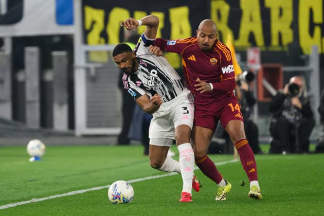 Gleison Bremer of Juventus FC and Donyell Malen of AS Roma compete for the ball during the Serie A 2025 2026 football match between AS Roma and Juventus FC at Stadio Olimpico in Rome (Italy), March 1, 2026. andreaxstaccioli