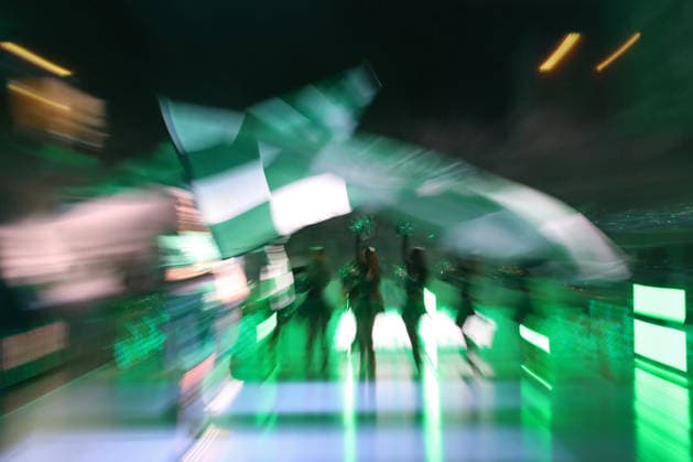 Handball DAIKIN HBL, SC DHfK Leipzig Bergischer HC 01 03 2026 A green and white flag of SC DHfK is waved while the cheerleaders danced in the green light below Zoom effect, symbolic image, feature, background handball, DAIKIN HBL, 1 Bundesliga, season 2025 2026, 23 match day SC DHfK Leipzig vs Bergischer HC on 01 03 2026 in the Quarterback Immobilien Arena Leipzig Copyright: xBEAUTIFULxSPORTS JanxKaeferx
