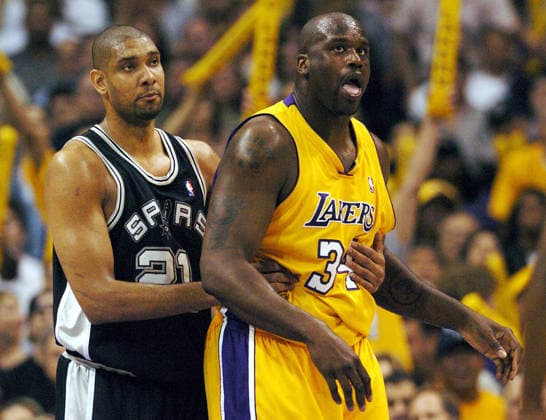 May 15, 2004; Los Angeles, CA, USA; Spurs Tim Duncan (left) looks in disbelief after fouling against Los Angeles Lakers Shaquille O Neal in the first half in Game 6 of the Western Conference semifinals at the Staples Center. The Lakers beat the Spurs 88-76. Los Angeles Texas U.S. Copyright: xKinxManxHuix
