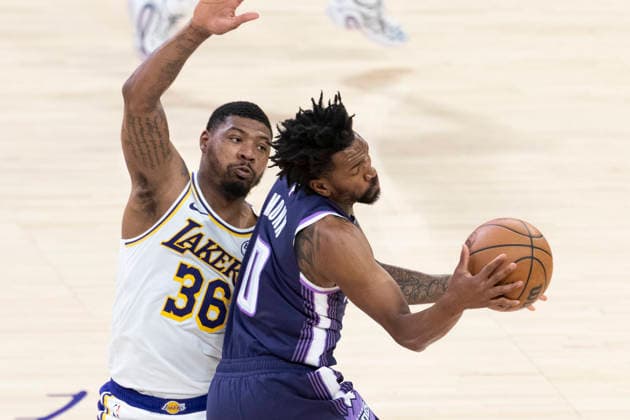 March 1, 2026, Los Angeles, California, USA: Sacramento KingsÃ¢â‚¬â ¢ Malik Monk (0) is defended by Los Angeles LakersÃ¢â‚¬â ¢ Marcus Smart (36) during an NBA, Basketball Herren, USA basketball game at Crypto.com Arena on Sunday, March 1, 2026 in Los Angeles. NBA 2026: Kings Vs Lakers  - ZUMAc68_ 20260301_zaf_c68_027 Copyright: xRingoxChiux