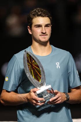 March 1, 2026: Joao Fonseca poses for photos, while holding the championship trophy, after winning the MGM Slam Presented by Capital One on March 1, 2026 at T-Mobile Arena in Las Vegas, NV. Cal Media. Las Vegas United States of America - ZUMAc04_ 20260301_zma_c04_236 Copyright: xChristopherxTrimx