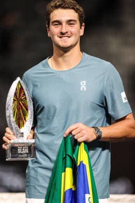 March 1, 2026: Joao Fonseca poses for photos, while holding the championship trophy, after winning the MGM Slam Presented by Capital One on March 1, 2026 at T-Mobile Arena in Las Vegas, NV. Cal Media. Las Vegas United States of America - ZUMAc04_ 20260301_zma_c04_241 Copyright: xChristopherxTrimx