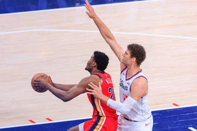 March 1, 2026, Inglewood, California, USA: Brook Lopez 11 of the Los Angeles Clippers tries to block a shot by Yves Missi 21 of the New Orleans Pelicans during their 2026 NBA, Basketball Herren, USA regular season game on Sunday March 1, 2026 at Intuit Dome Arena in Inglewood, California. JAVIER ROJAS PI Inglewood USA - ZUMAp124 20260301_zaa_p124_043 Copyright: xJavierxRojasx