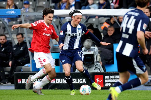 DEU, DFL, 2 FBL, Hertha BSC vs 1 FC Nuernberg, 01 03 2026, Berliner Olympiastadion, Berlin, DEU, DFL, 2 FBL, Hertha BSC vs 1 FC Nuernberg, im Bild Fabian Reese Hertha BSC Berlin 11 , TOM BAACK 1 FC Nuernberg 5 DFL regulations prohibit any use of Photographs as image sequences and or quasi video nordphotoxGmbHx xEngler nph00076