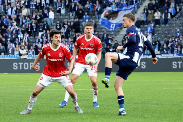 DEU, DFL, 2 FBL, Hertha BSC vs 1 FC Nuernberg, 01 03 2026, Berliner Olympiastadion, Berlin, DEU, DFL, 2 FBL, Hertha BSC vs 1 FC Nuernberg, im Bild Michael Cuisance Hertha BSC Berlin 10 , TOM BAACK 1 FC Nuernberg 5 , FINN BECKER 1 FC Nuernberg 25 DFL regulations prohibit any use of Photographs as image sequences and or quasi video nordphotoxGmbHx xEngler nph00076