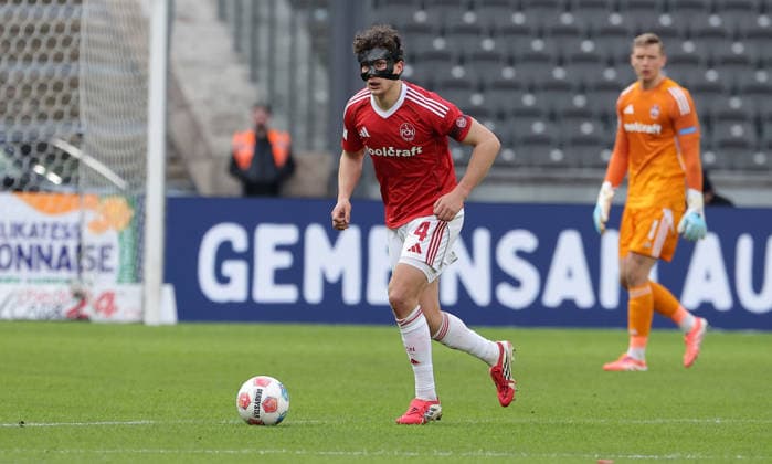 Fabio Gruber with mask on the ball Single image Crop action Sport Soccer Football DFL 2 Bundesliga Men 24 Matchday Season 2025 2026 01 03 2026 Hertha BSC Berlin vs 1 FC Nürnberg FCN DFL regulations prohibit any use of photographs as image sequences and or quasi video