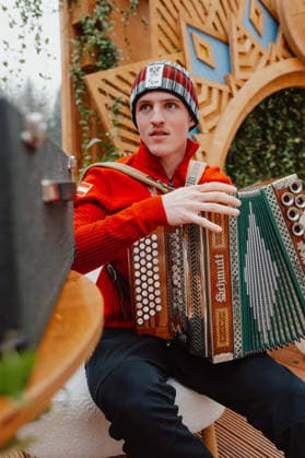 PARALYMPICS - Winter Paralympics Milano Cortina 2026 CORTINA D AMPEZZO,ITALY,02.MAR.26 - PARALYMPICS - Paralympic Winter games, Winterspiele,Spiele, Summer games Milano Cortina 2026, preview. Image shows Johannes Aigner (AUT) with his accordion.  GEPAxpictures xAlexanderxSolc