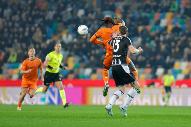 March 2, 2026, Udine, Italy, Italy: UdineseÃ¢â‚¬â ¢s Nicolo Bertolain action against FiorentinaÃ¢â‚¬â ¢s Moise Kean during the Italian Serie A Enilive match between Udinese Calcio vs ACF Fiorentina at the Bluenergy Stadium in Udinese, Italy, 02 March 2026. Udine Italy - ZUMAr199 20260302_zsp_r199_008 Copyright: xMattiaxRadonix