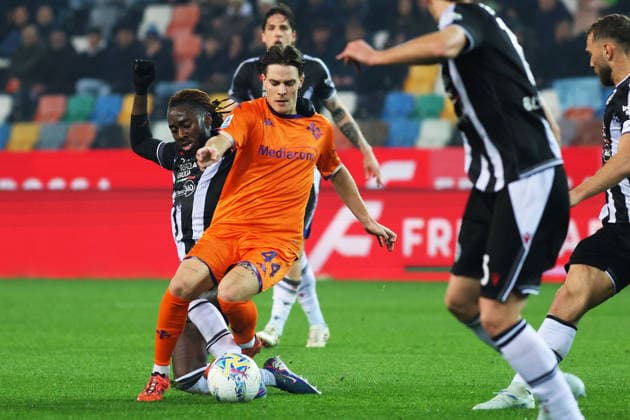 Fiorentina s Nicolo Fagioli fights for the ball with Udinese s Jordan Zemura during the Serie A soccer match between Udinese and Fiorentina at the Bluenergy Stadium in Udine, north east Italy - Monday, March 2,2026 - soccer  Copyright: xAndreaxBressanutti LaPressex