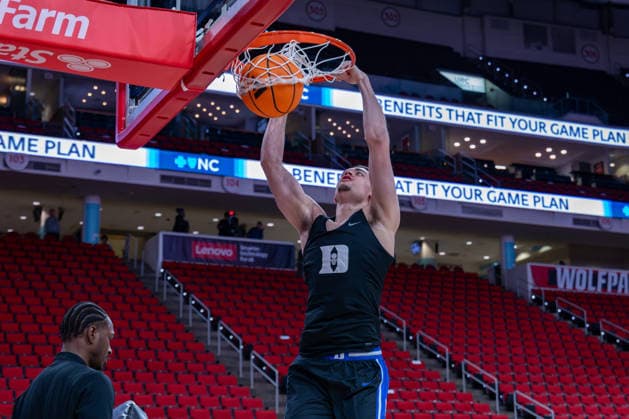 March 2, 2026, Raleigh, North Carolina, USA: Duke Blue Devils guard DARREN HARRIS (8) dunks the ball during warmups prior to the NCAA, College League, USA ACC menÃ¢â‚¬â ¢s basketball game between the Duke Blue Devils and the NC State Wolfpack at the Lenovo Center in Raleigh, North Carolina. Raleigh USA - ZUMAa220 20260302_znp_a220_014 Copyright: xIsraelxAntax