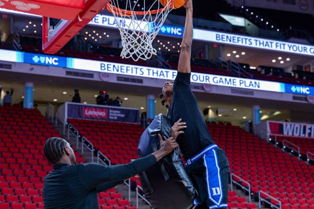 March 2, 2026, Raleigh, North Carolina, USA: Duke Blue Devils guard ISAIAH EVANS (3) drives to the basket and goes up for the dunk during warmups prior to the NCAA, College League, USA ACC menÃ¢â‚¬â ¢s basketball game between the Duke Blue Devils and the NC State Wolfpack at the Lenovo Center in Raleigh, North Carolina. Raleigh USA - ZUMAa220 20260302_znp_a220_015 Copyright: xIsraelxAntax