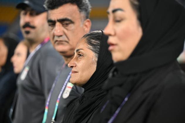 SOCCER ASIAN CUP SOUTH KOREA IRAN, Islamic Republic of Iran coach looks on during the Iran national anthem during the AFC Women™s Asian Cup Group A match between South Korea and Iran at Robina Stadium on the Gold Coast, Monday, March 2, 2026. ( NO ARCHIVING, EDITORIAL USE ONLY GOLD COAST QUEENSLAND AUSTRALIA  Copyright: xDAVExHUNTx 20260303120910877428