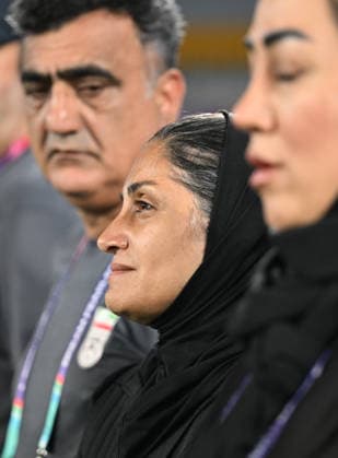 SOCCER ASIAN CUP SOUTH KOREA IRAN, Islamic Republic of Iran coach Marziyeh Jafari looks on during the Iran national anthem during the AFC Women™s Asian Cup Group A match between South Korea and Iran at Robina Stadium on the Gold Coast, Monday, March 2, 2026. ( NO ARCHIVING, EDITORIAL USE ONLY GOLD COAST QUEENSLAND AUSTRALIA  Copyright: xDAVExHUNTx 20260303179806020784