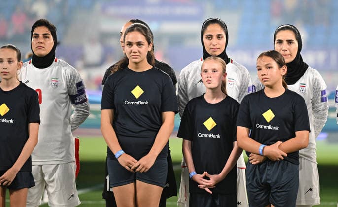 SOCCER ASIAN CUP SOUTH KOREA IRAN, Islamic Republic of Iran players stand during the Iran national anthem prior to the AFC Women™s Asian Cup Group A match between South Korea and Iran at Robina Stadium on the Gold Coast, Monday, March 2, 2026. ( NO ARCHIVING, EDITORIAL USE ONLY GOLD COAST QUEENSLAND AUSTRALIA  Copyright: xDAVExHUNTx 20260303199801215881