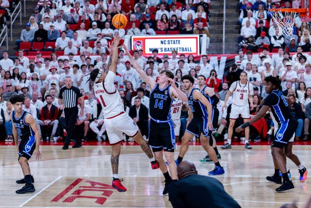 March 2, 2026, Raleigh, North Carolina, USA: NC State Wolfpack forward DARRION WILLIAMS (1) shoots a jump shot over Duke Blue Devils guard NIKOLAS KHAMENIA (14) during the first half of the NCAA, College League, USA ACC menÃ¢â‚¬â ¢s basketball game between the Duke Blue Devils and the NC State Wolfpack at the Lenovo Center in Raleigh, North Carolina. Raleigh USA - ZUMAa220 20260302_znp_a220_035 Copyright: xIsraelxAntax