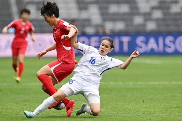 SOCCER ASIAN CUP NORTH KOREA UZBEKISTAN, Mamatkarimova Zarina of Uzbekistan tackles Han Jin Hong of North Korea during the AFC Women™s Asian Cup Group B match between North Korea and Uzbekistan at CommBank Stadium in Sydney, Tuesday, March 3, 2026. ( NO ARCHIVING, EDITORIAL USE ONLY SYDNEY NEW SOUTH WALES AUSTRALIA  Copyright: xDEANxLEWINSx 20260303183966318492