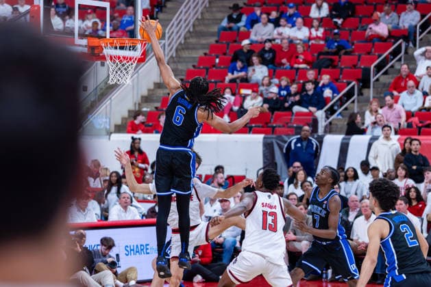 March 2, 2026, Raleigh, North Carolina, USA: Duke Blue Devils forward MALIQ BROWN (6) blocks a NC State Wolfpack guard MATT ABLE (3) shot during the second half of the NCAA, College League, USA ACC menÃ¢â‚¬â ¢s basketball game between the Duke Blue Devils and the NC State Wolfpack at the Lenovo Center in Raleigh, North Carolina. Raleigh USA - ZUMAa220 20260302_znp_a220_067 Copyright: xIsraelxAntax