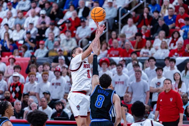 March 2, 2026, Raleigh, North Carolina, USA: NC State Wolfpack guard MATT ABLE (3) shoots a jump shot over Duke Blue Devils guard DARREN HARRIS (8) during the second half of the NCAA, College League, USA ACC menÃ¢â‚¬â ¢s basketball game between the Duke Blue Devils and the NC State Wolfpack at the Lenovo Center in Raleigh, North Carolina. Raleigh USA - ZUMAa220 20260302_znp_a220_081 Copyright: xIsraelxAntax