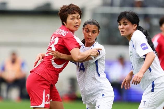 Ri Hye-Gyong of DPR Korea contests the ball with Gulzoda Amirova of Uzbekistan during the AFC Womens Asian Cup 2026 match between Korea DPR Women and Uzbekistan Women at Western Sydney Stadium, Sydney, Australia on 3 March 2026. Copyright: xPeterxDovganx 44600039