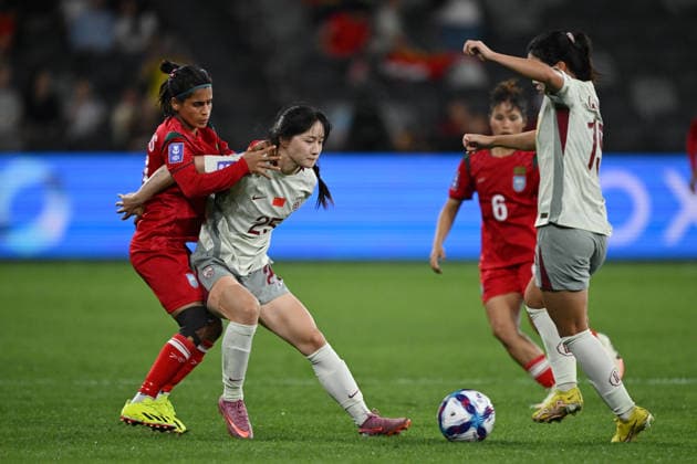 SOCCER ASIAN CUP CHINA BANGLADESH, Lyu Yatong of China holds back Shamsunnahar of Bangladesh as Wu Haiyan of China takes control of the ball during the AFC Women™s Asian Cup Group B match between China and Bangladesh at CommBank Stadium in Sydney, Tuesday, March 3, 2026. ( NO ARCHIVING, EDITORIAL USE ONLY SYDNEY NEW SOUTH WALES AUSTRALIA  Copyright: xDEANxLEWINSx 20260303136394469422