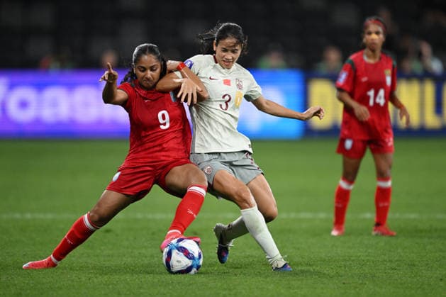 SOCCER ASIAN CUP CHINA BANGLADESH, Rania Sidiqi Anika of Bangladesh and Chen Qiaozhu of China compete for the ball during the AFC Women™s Asian Cup Group B match between China and Bangladesh at CommBank Stadium in Sydney, Tuesday, March 3, 2026. ( NO ARCHIVING, EDITORIAL USE ONLY SYDNEY NEW SOUTH WALES AUSTRALIA  Copyright: xDEANxLEWINSx 20260303184197050493