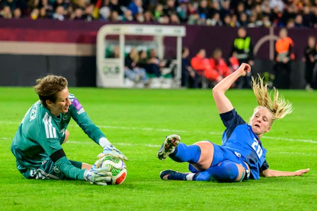 In the picture, from left Ann Katrin Berger Germany , Zara Kramžar, Action, duels, fighting for the ball, GER, Dresden, World Cup Qualification, Women, Germany vs Slovenia, at Rudolf Harbig Stadium Dresden, League A, Group A4, soccer, DFB, league phase, match day 1, DFB DFL REGULATIONS PROHIBIT ANY USE OF PHOTOGRAPHS AS IMAGE SEQUENCES AND OR QUASI VIDEO, March 3, 2026 Copyright: HMBxMedia UwexKoch